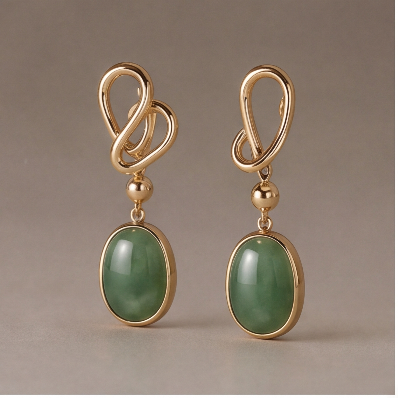 1786326952_184f7ebc-1 Oval Green Jade Drop Earrings with Twisted Knot Top in Gold-Tone Finish - Image 1