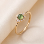 Round Jade Cabochon Ring with Scalloped Cubic Zirconia Halo in Gold Tone
