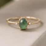 Oval Jade Cabochon Ring with Graduated Cubic Zirconia Shoulders in Gold Tone - Image 7