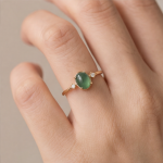 Oval Jade Cabochon Ring with Graduated Cubic Zirconia Shoulders in Gold Tone - Image 2