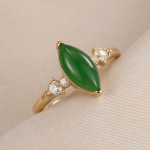 Marquise Jade Cabochon Ring with Cubic Zirconia Shoulders in Gold Tone
