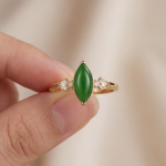 Marquise Jade Cabochon Ring with Cubic Zirconia Shoulders in Gold Tone - Image 7