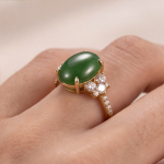 Oval Jade Ring with Cubic Zirconia Flower Clusters in Yellow Gold Tone - Image 5
