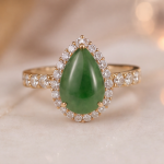 Pear-Shaped Jade Halo Ring with Pave Band in Yellow Gold Tone