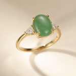 Oval Green Chalcedony Ring with Trillion Accents in Yellow Gold Tone