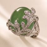 Domed Jade Cabochon Ring with Pave Feather Motif in White Gold Tone - Image 3