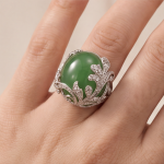 Domed Jade Cabochon Ring with Pave Feather Motif in White Gold Tone - Image 2