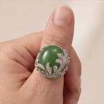 Domed Jade Cabochon Ring with Pave Feather Motif in White Gold Tone - Image 8