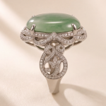 Large Oval Jade Ring with Pave Ribbon Scrolls in White Gold Tone - Image 7