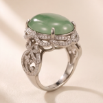 Large Oval Jade Ring with Pave Ribbon Scrolls in White Gold Tone