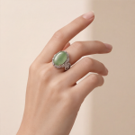 Large Oval Jade Ring with Pave Ribbon Scrolls in White Gold Tone - Image 8