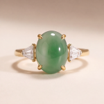 Oval Green Jade Three-Stone Ring with Trillion Cubic Zirconia in Gold Tone - Image 9