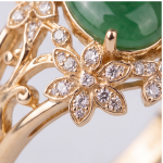Oval Green Jade Ring with Marquise Cubic Zirconia Leaf Frame in Gold Tone - Image 7