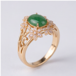 Oval Green Jade Ring with Marquise Cubic Zirconia Leaf Frame in Gold Tone