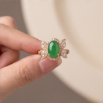 Oval Green Jade Ring with Cubic Zirconia Petal Wings in Rose Gold Tone - Image 2