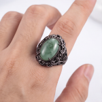 : Oval Green Jade Ring with Pierced Filigree Gallery in Gunmetal Tone - Image 8