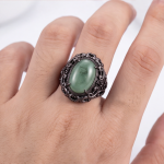 : Oval Green Jade Ring with Pierced Filigree Gallery in Gunmetal Tone - Image 2
