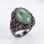 : Oval Green Jade Ring with Pierced Filigree Gallery in Gunmetal Tone