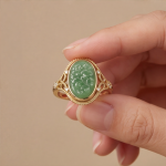 Oval Carved Green Jade Ring with Filigree Shoulders in Gold Tone - Image 2
