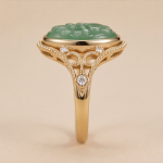 Oval Carved Green Jade Ring with Filigree Shoulders in Gold Tone - Image 4