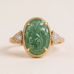 Oval Carved Green Jade Ring with Trillion Cubic Zirconia Shoulders in Gold Tone - Image 3