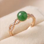 Green Jade Cabochon Infinity Twist Ring in Rose Gold Plate