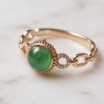 Green Jade Cabochon Ring with Beaded Bezel and Open Link Shoulders in Rose Gold Plate
