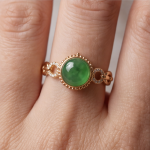 Green Jade Cabochon Ring with Beaded Bezel and Open Link Shoulders in Rose Gold Plate - Image 2