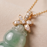 Carved Jade Gourd Pendant Necklace with Floral Bail in Gold Tone - Image 8