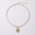 Oval Jade Cabochon Halo Pendant on Pearl and Gold Bead Necklace