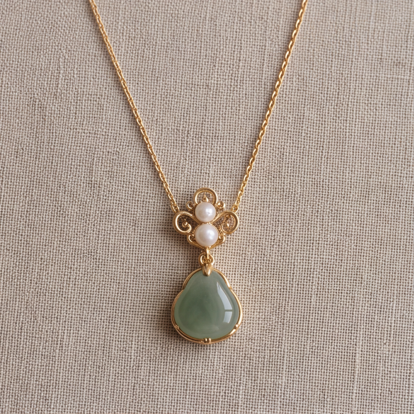 1786426187_60c4bee1-1 Jade Teardrop Pendant Necklace with Triple Pearl Scroll Motif - 图片 1