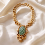 Carved Jade Cabochon Pendant on Chunky Gold Curb Chain