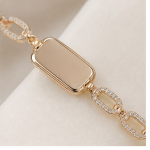 Emerald-Cut Green Stone Bracelet with Pave Oval Links in Gold Tone - Image 9