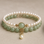 Double Strand Pearl and Green Jade Bracelet with Jade Cabochon Charm - Image 2