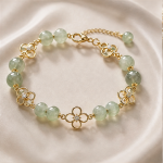Green Prehnite Bead Bracelet with Gold-Tone Clover Stations