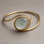 Oval Jade Cabochon Open Bangle in Gold Tone