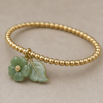 Gold Beaded Bracelet with Jade Flower and Leaf Charm