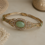 Oval Green Cabochon Filigree Bangle in Gold Tone
