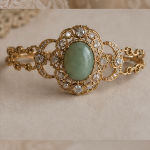 Oval Green Cabochon Halo Bracelet in Gold Tone