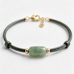 Jade Barrel Bracelet on Dark Green Leather Cord