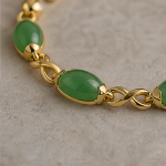 Oval Green Jade Infinity Link Bracelet in Gold Tone - 图片 4