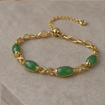 Oval Green Jade Infinity Link Bracelet in Gold Tone
