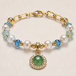 Green Jade Cabochon Charm Bracelet with Pearls and Blue Crystal in Gold Tone