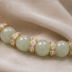 Pale Green Jade Bead Bracelet with Pave Rondelles in Gold Tone - Image 7