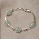 Oval Green Jade Station Bracelet in Sterling Silver