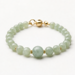 Pale Green Jade Beaded Bracelet with Magnetic Ball Clasp in Gold Tone