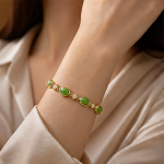 Oval Green Jade and Square Cubic Zirconia Bracelet in Gold Tone - Image 2
