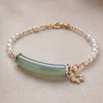 Curved Green Jade Bar and Pearl Bracelet with Flower Charm in Gold Tone