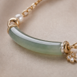 Curved Green Jade Bar and Pearl Bracelet with Flower Charm in Gold Tone - Image 4