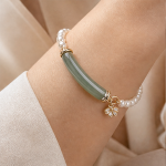 Curved Green Jade Bar and Pearl Bracelet with Flower Charm in Gold Tone - Image 2